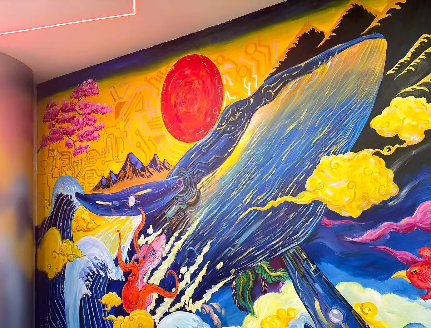 Hand-painted mechanical whale mural at the GaiaX Goldhill campus